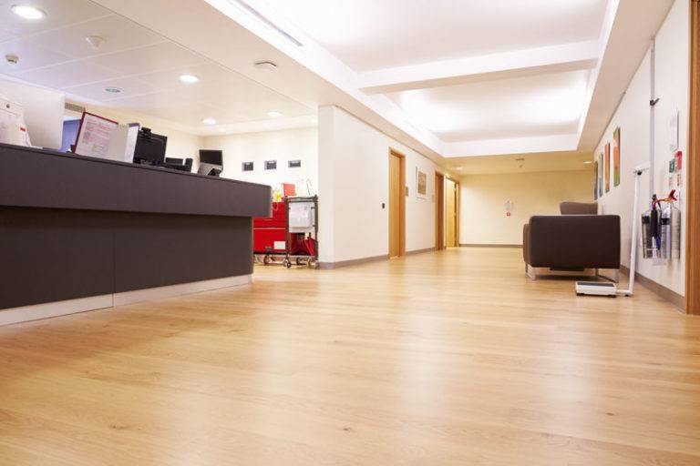 Hospital reception with vinyl wood floor